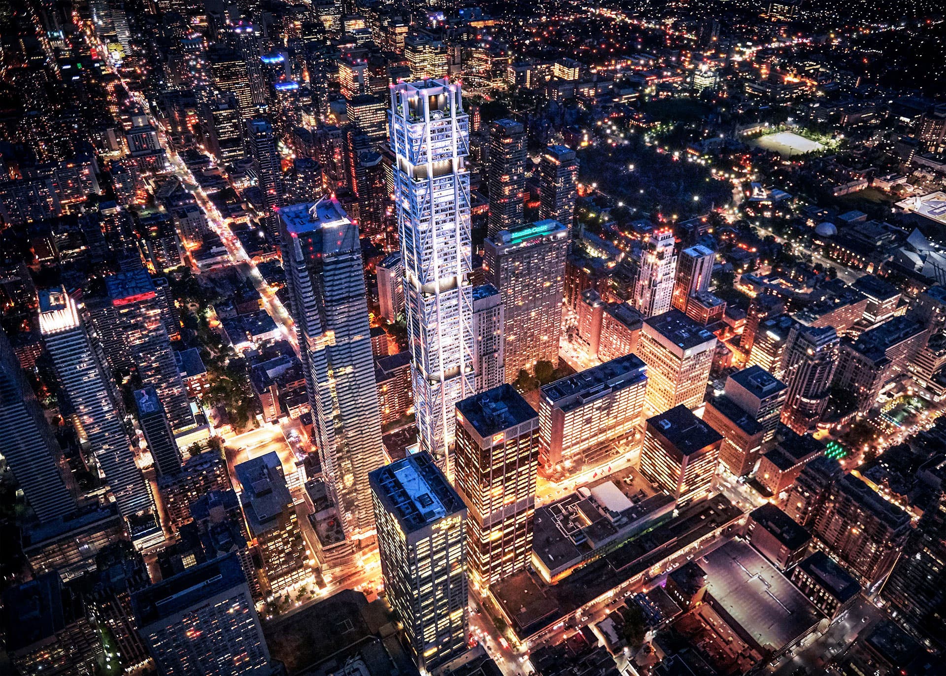 One Bloor West illuminated above the Toronto skyline at night — Canada's first supertall by Foster + Partners